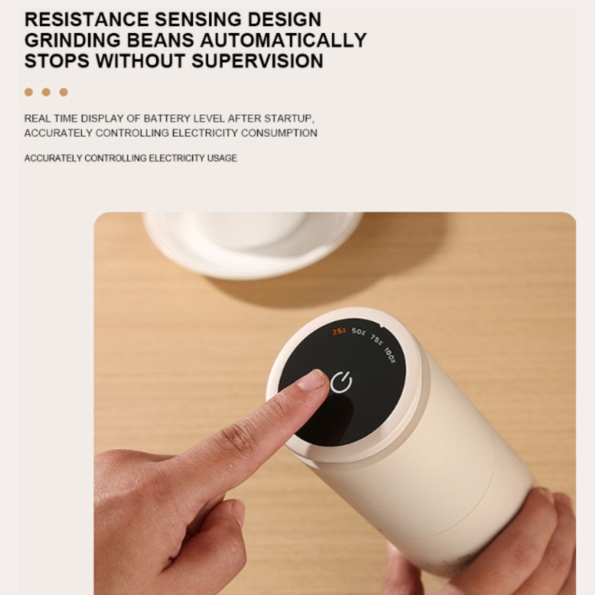 Electric coffee grinder with a hand pressing a button on a wooden surface