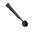 Black measuring spoon on a white background