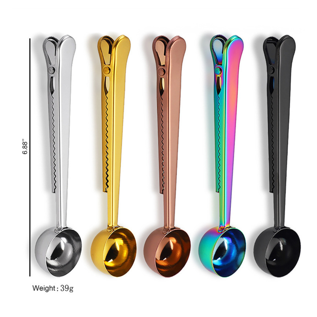 Set of five colorful measuring spoons on a white background